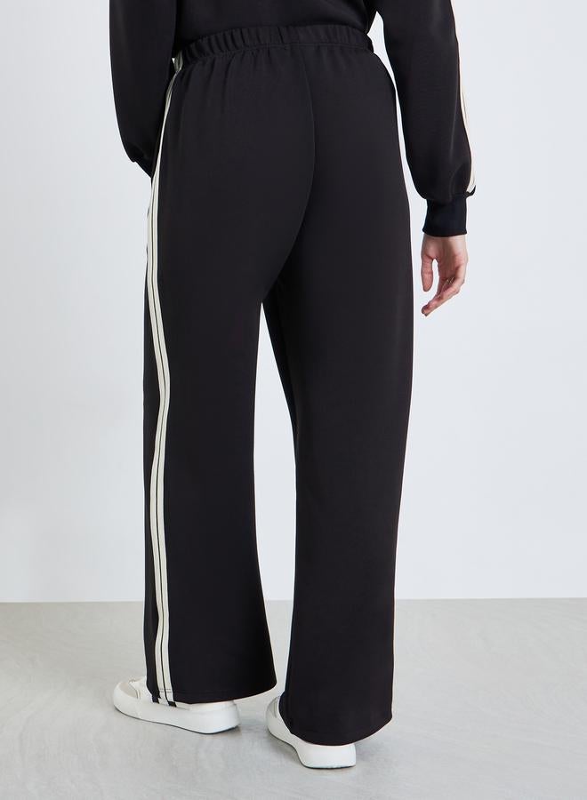Styli Women Black Wide Leg Joggers with Stripe Detail - Image 4